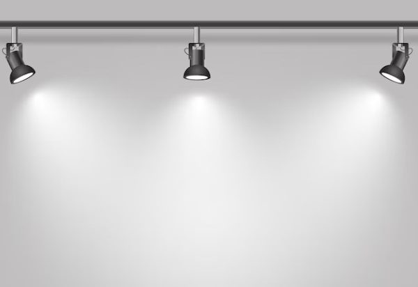 Dê destaque aos ambientes com spots de sobrepor para uma iluminação direcionada